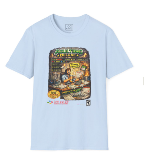 Adulting Deluxe T‑Shirt — Funny Video Game Parody "Adulting Deluxe" Graphic Tee for New Grads & Young Adults